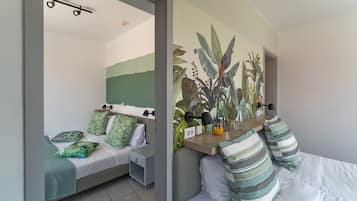 Desk, laptop workspace, free WiFi, bed sheets