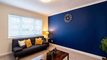 House | Living room | 30-inch TV with digital channels