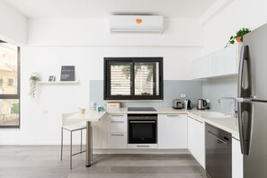 Fridge, microwave, oven, dishwasher - MAMAD Fresh Design 2BR in City Center by FeelHome (Tel Aviv - Jaffa)