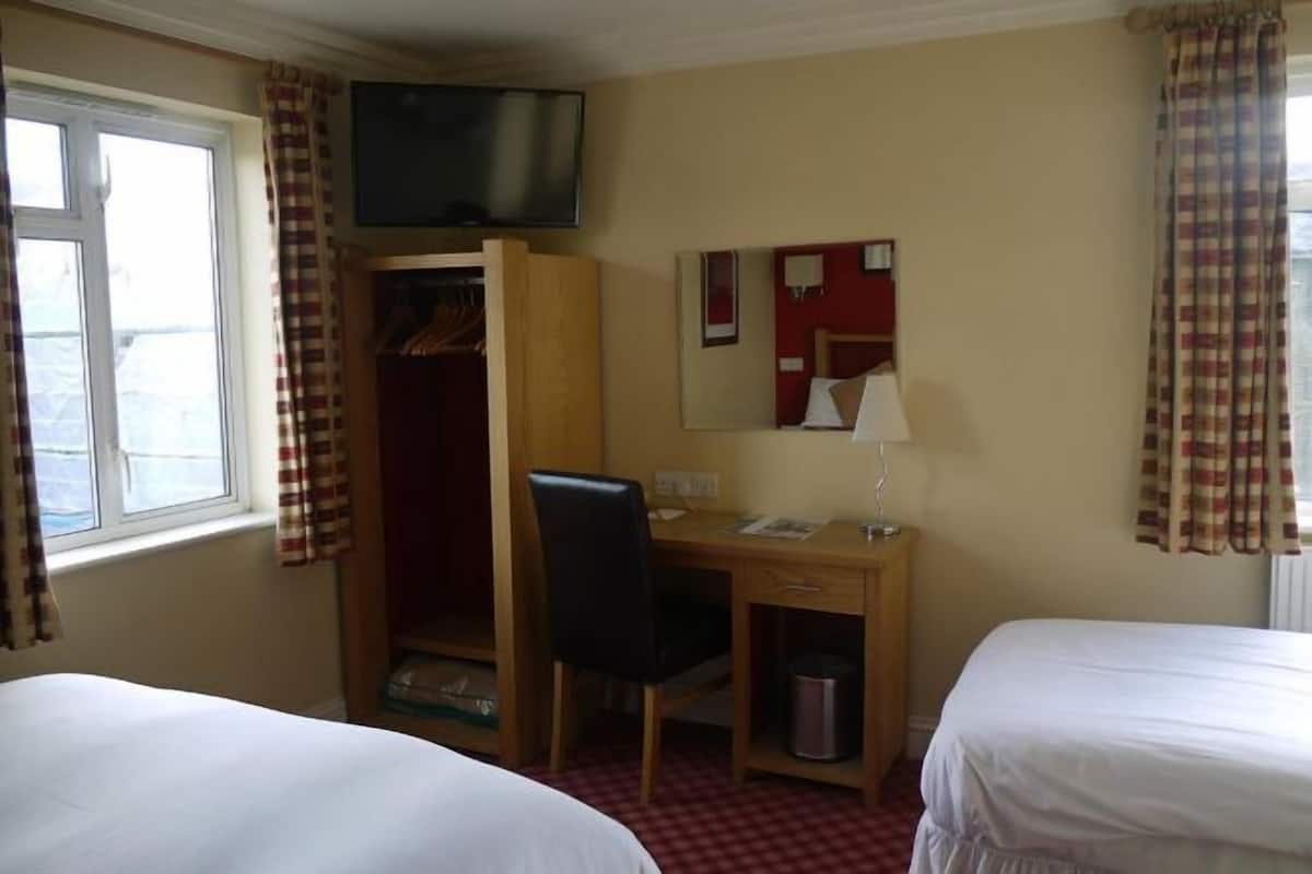 Desk, iron/ironing board, free WiFi, bed sheets