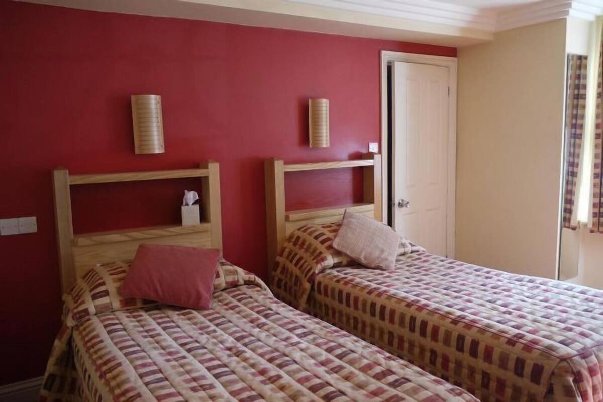 Desk, iron/ironing board, free WiFi, bed sheets