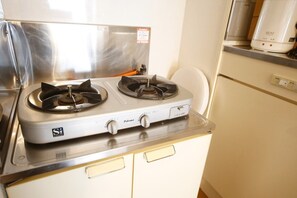 Fridge, microwave, stovetop, cookware/dishes/utensils