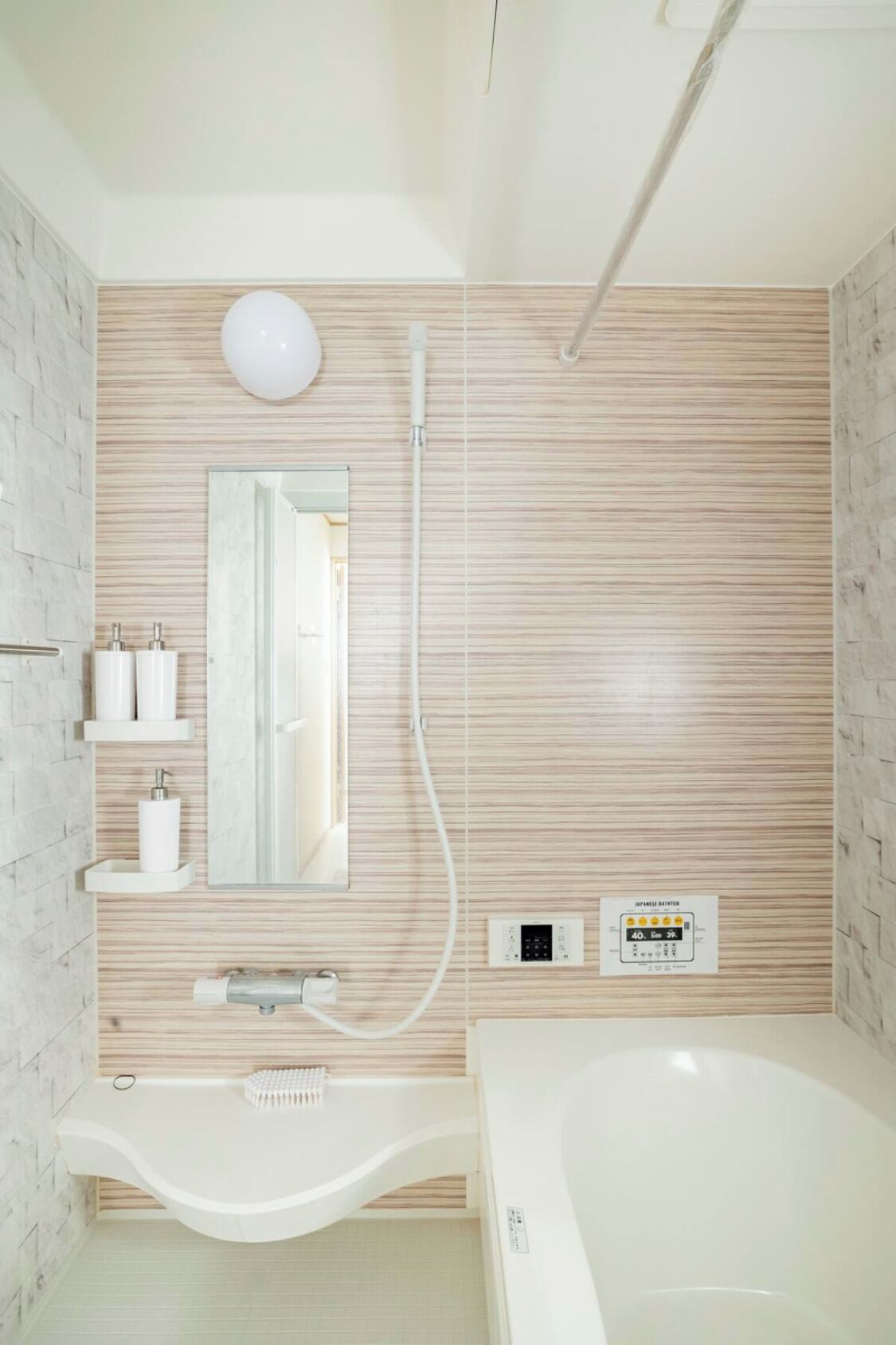 Combined shower/tub, hair dryer, bidet, towels