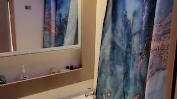 Shower, towels, soap, shampoo
