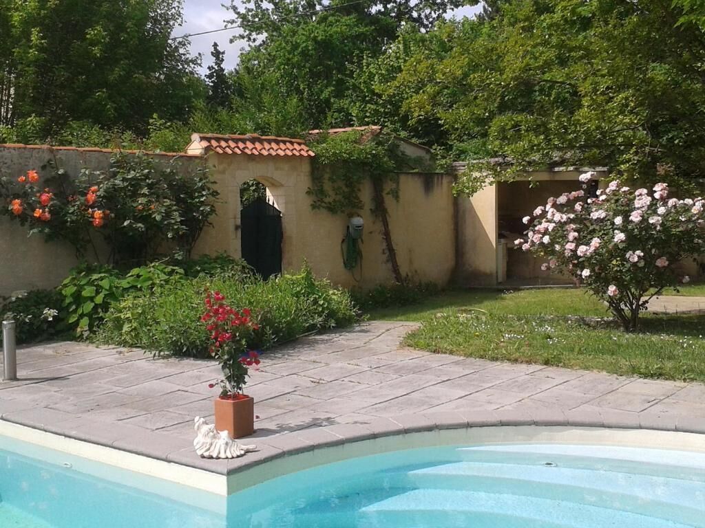 Seasonal outdoor pool, pool loungers