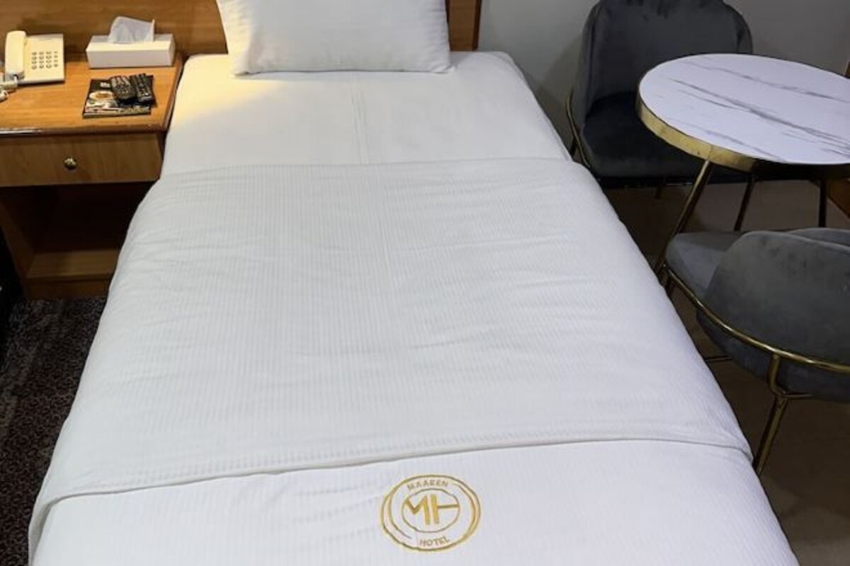 Minibar, iron/ironing board (on request), WiFi (free), bed sheets