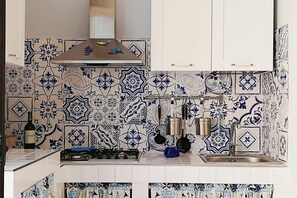 Fridge, microwave, coffee/tea maker, toaster