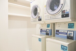 Convenient laundry facilities offer washing and drying options.