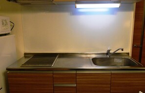 Fridge, microwave, stovetop, cookware/dishes/utensils