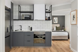 1 chambre, coffres-forts dans les chambres, fer et planche à repasser