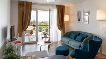 Apartment, Accessible, Ensuite (T2) | Living area | 94-cm LED TV with digital channels, TV