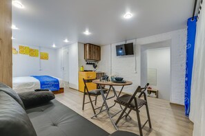 Apartamento família | 1 quarto, ferros/tábuas de passar roupa, Wi-Fi de cortesia