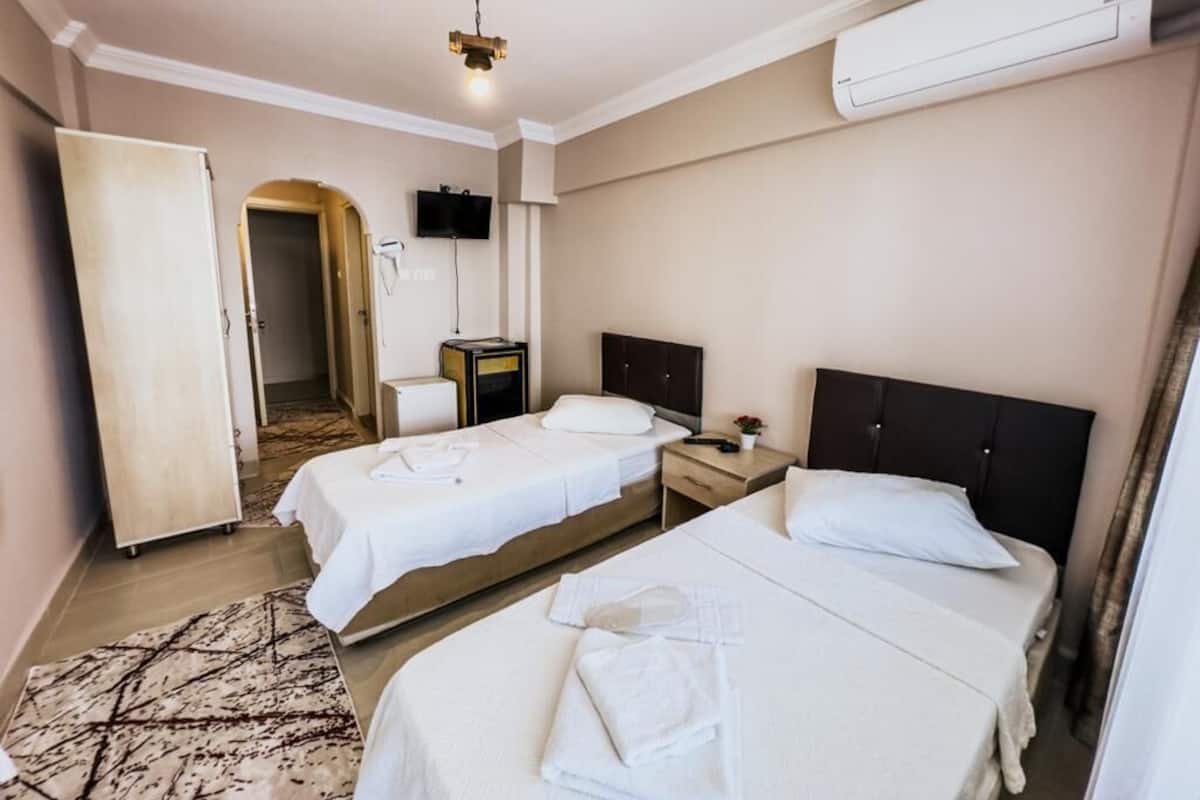 Premium bedding, individually furnished, desk, laptop workspace