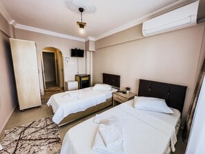 Premium bedding, individually furnished, desk, laptop workspace