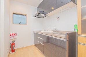Fridge, microwave, stovetop, cookware/dishes/utensils