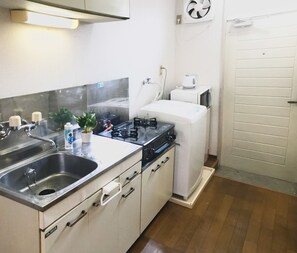 Fridge, microwave, cookware/dishes/utensils