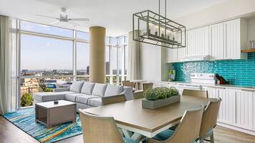 Deluxe Suite, 2 Bedrooms, Non Smoking, Kitchen | Living room | 55-inch LCD TV with digital channels, TV, pay movies
