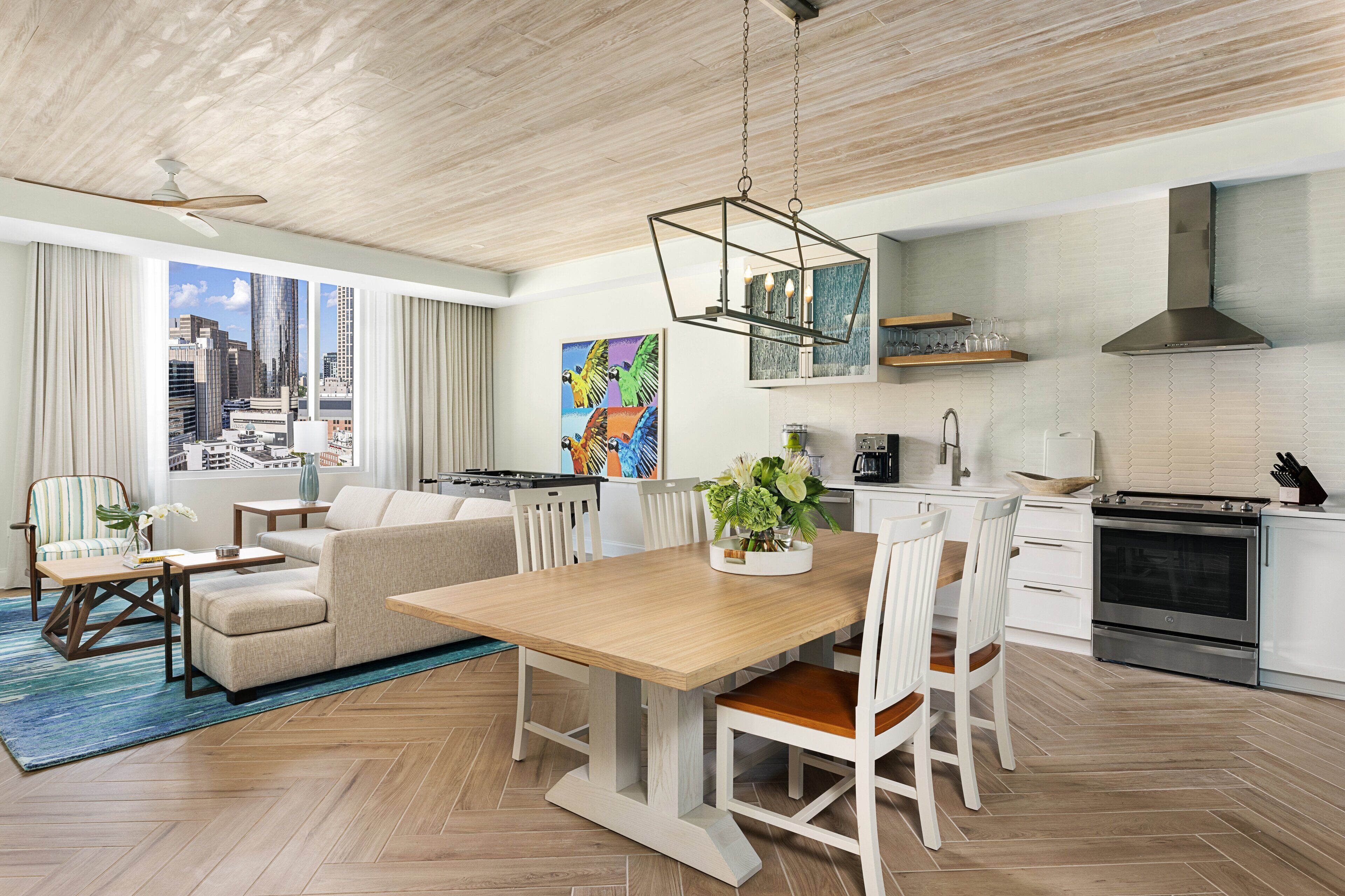 deluxe suite, 1 bedroom, non smoking, kitchen | living room | 55-inch lcd tv with digital channels, tv, pay films