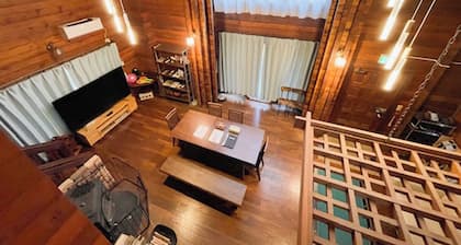 A lodge with a fireplace nestled in the forest of Aso accommodates up to 9 people / Aso Kumamoto