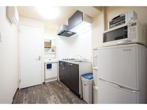 Fridge, microwave, stovetop, cookware/dishes/utensils