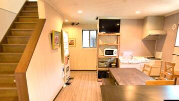 Fridge, microwave, stovetop, cookware/dishes/utensils