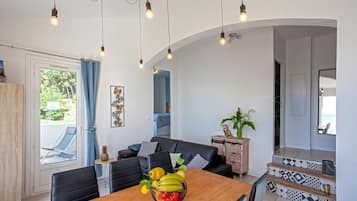 Family Apartment, Patio, Sea View | Living area