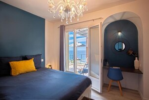 Apartamento standard, varanda, vista para o mar | 2 quartos, ferros/tábuas de passar roupa, Wi-Fi de cortesia