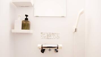 Hair dryer, towels, shampoo