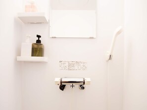 Hair dryer, towels, shampoo