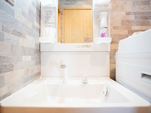 Hair dryer, towels, shampoo
