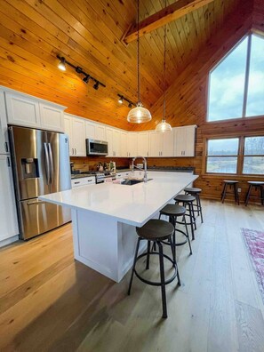 Fridge, microwave, oven, stovetop - Bring family and friends to this beautiful, spacious, open plan log home.  (Marilla)