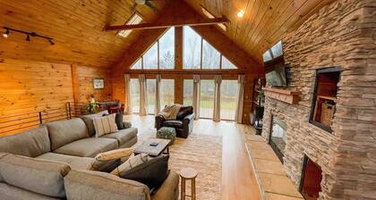 Bring family and friends to this beautiful, spacious, open plan log home.
