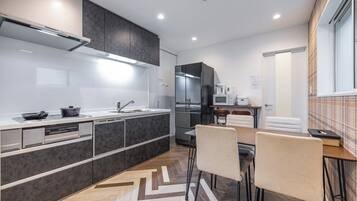 Fridge, microwave, cookware/dishes/utensils