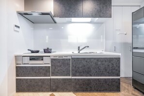 Fridge, microwave, cookware/dishes/utensils - Nakamichi Ikannikan Room A2LDK3beds2Toilets - Nakamichi IKANIKAN Room A / Osaka Ōsaka (Osaka)