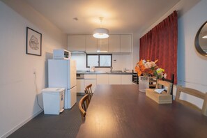 Fridge, microwave, cookware/dishes/utensils