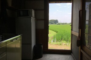 Fridge, microwave, stovetop, cookware/dishes/utensils