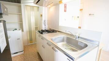 Fridge, microwave, stovetop, cookware/dishes/utensils