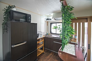 Fridge, microwave, cookware/dishes/utensils