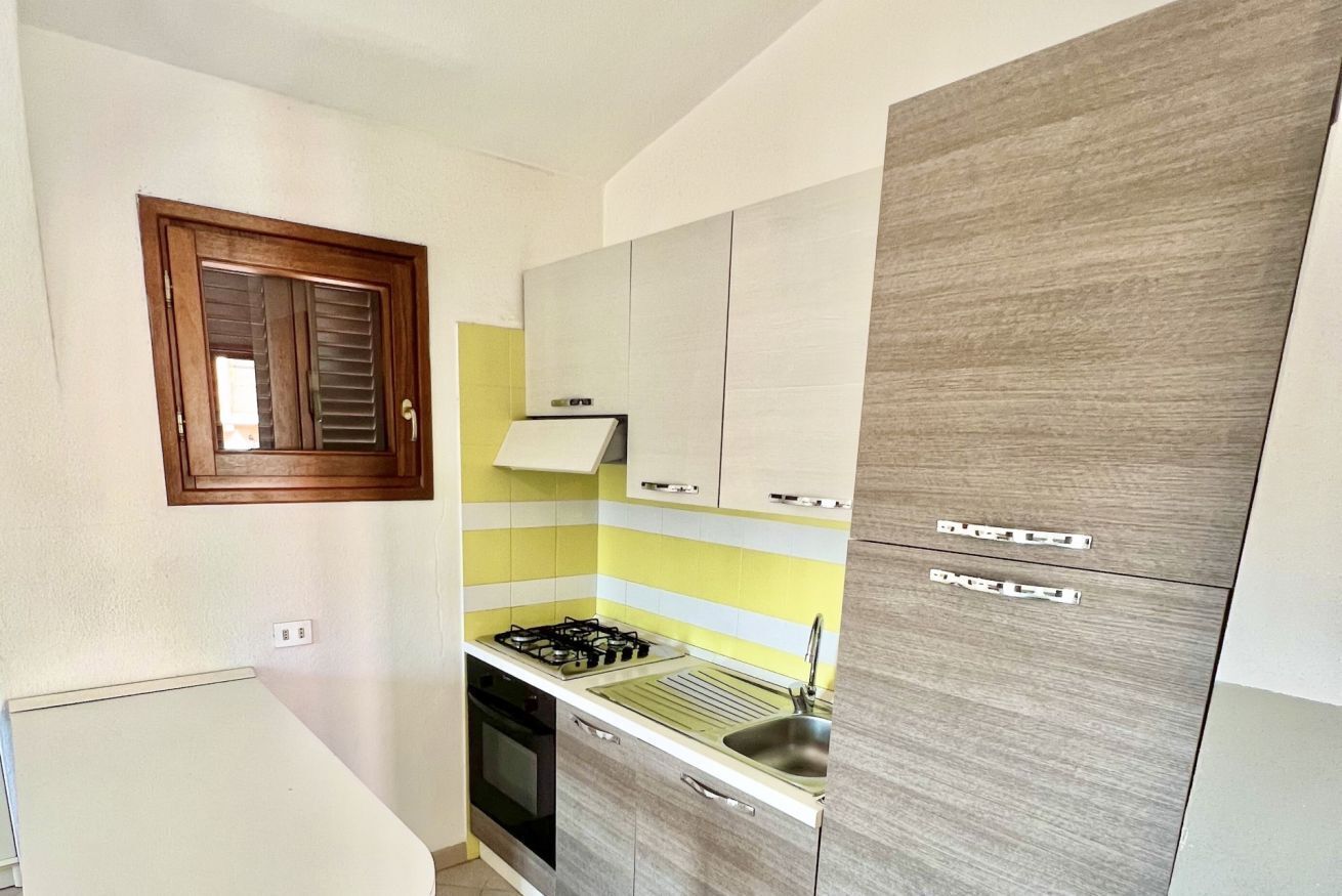 Frigorifero, forno, piano cottura, macchina per tè/caffè