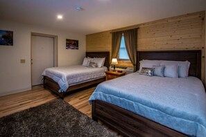 1 bedroom, desk, iron/ironing board, travel crib