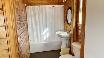 Combined shower/tub, towels, soap, toilet paper