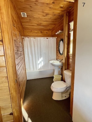 Combined shower/bathtub, towels - Lake front weekend cabin #8 Cabin with kitchen, steps from Possum Kingdom Lake (Graham)