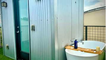 Bathtub, hair dryer, towels