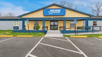Simple, functional design with a flat roof and accessible entrance.