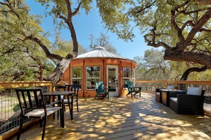Outdoor dining - Breathtaking Treehouse Yurt! King Bed and Spa! (Dripping Springs)