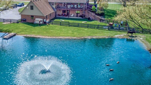 A large house with a deck and a swimming pool. - Peaceful 2BR Farm Stay - 10 Min To Grand Park (Sheridan)
