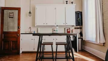 Microwave, stovetop, coffee/tea maker, cookware/dishes/utensils