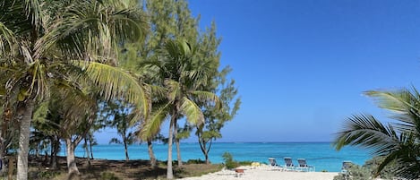 On the beach, sun loungers, beach towels