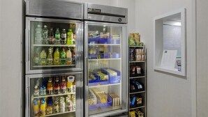 A vending machine with various beverages and snacks. - Comfort Inn & Suites (Mount Laurel)