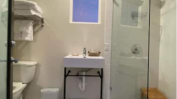Bathtub, hair dryer, towels